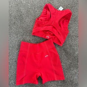 AYBL red Reflex seamless sports bra and shorts set.
